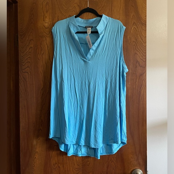 Heimish Full Size Sleeveless Ribbed Babydoll Top